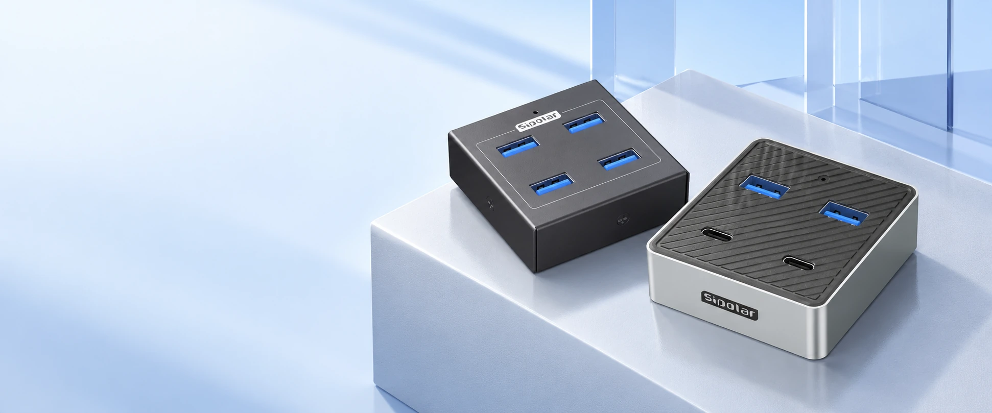 Sipolar A-4U32M2 and FD-2A2C32H1 USB hubs on a pale blue studio platform